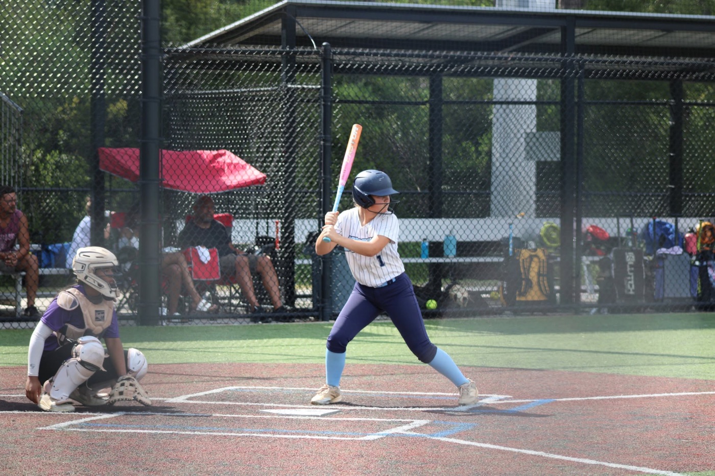 Andie Hartley playing softball