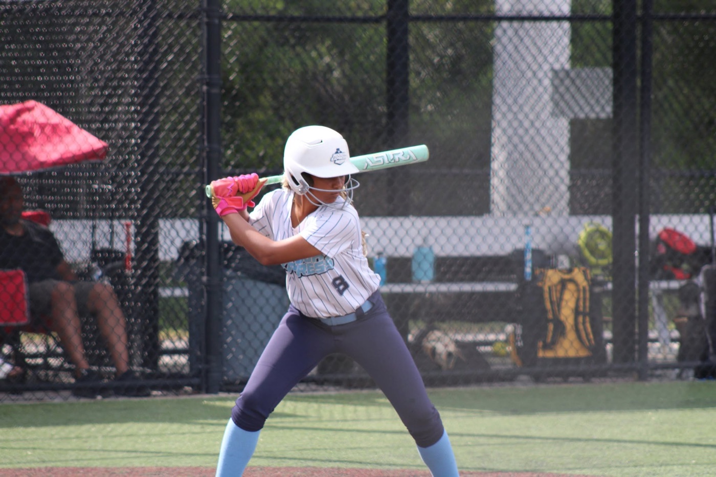 Makhenzie Clark playing softball